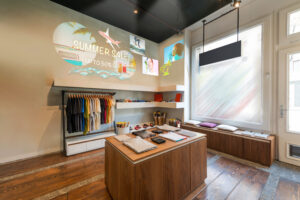 Epson EB-805F ultra-short throw projector displaying digital signage content