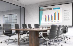 Epson EB-L630SU short throw projector displaying sharp visuals in a modern conference room.