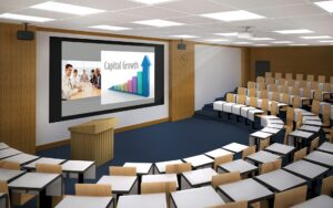 Epson EBL730u projector in a modern conference room.